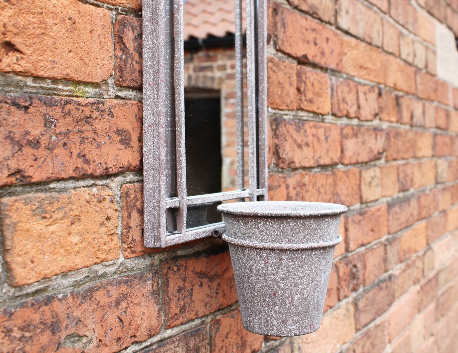 Metal Wall Mirror with Planter - a Cheeky Plant